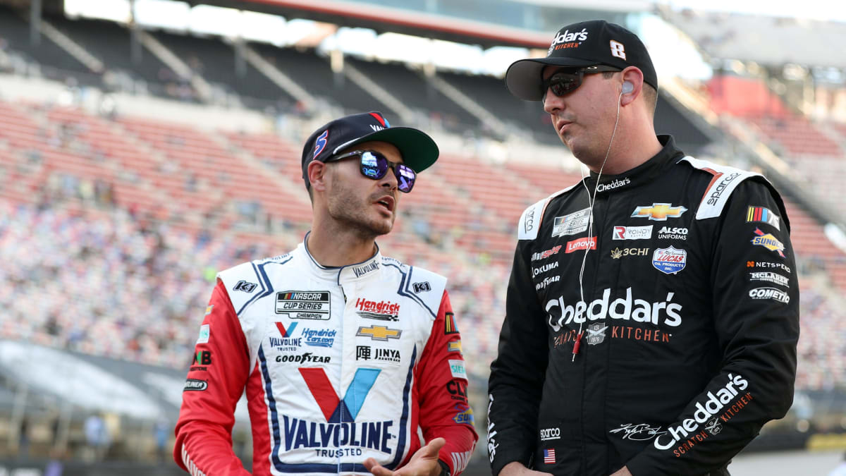 Kyle Larson celebrates sprint car victory at Davenport Speedway with Busch Bow tribute gesture