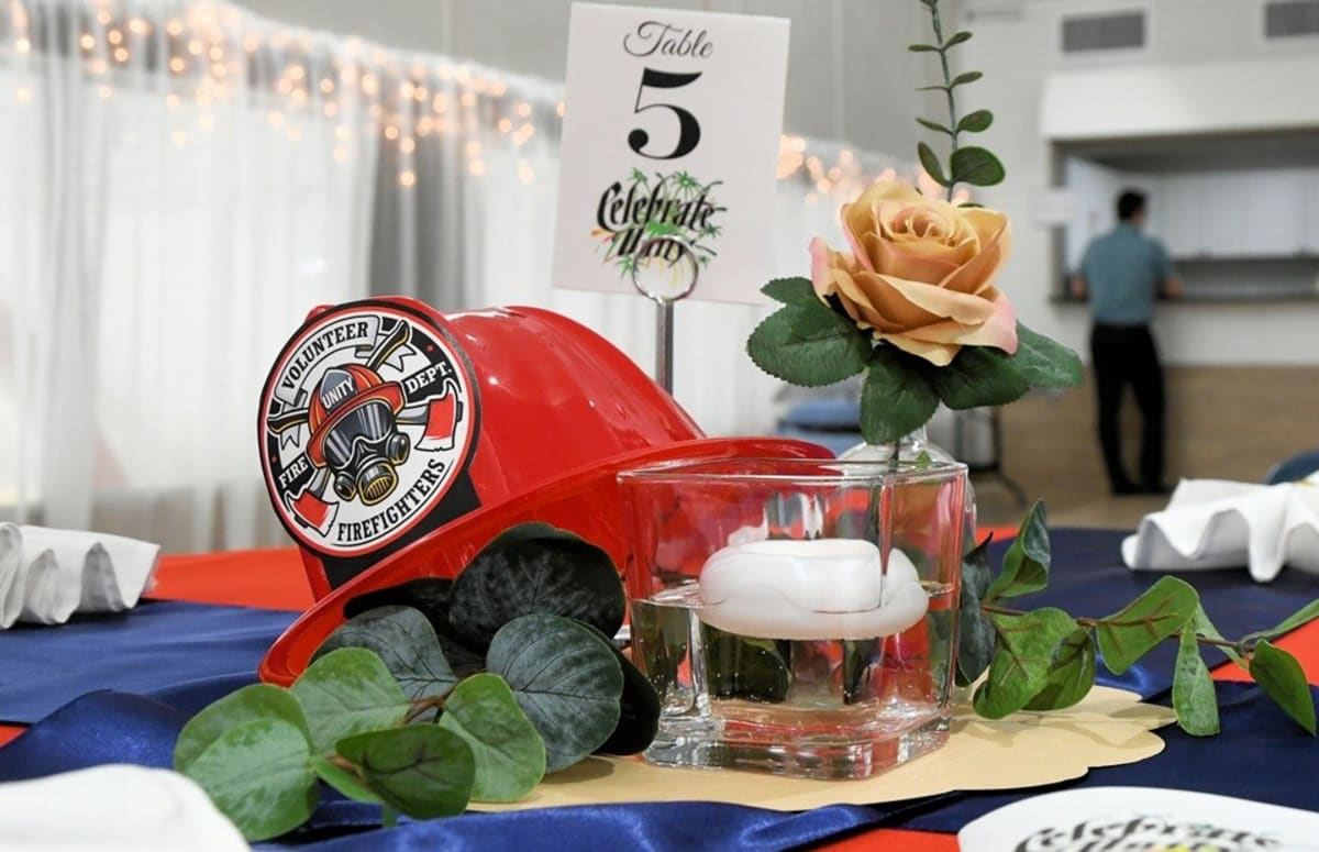 Small town business owners celebrating milestone anniversaries at community recognition event in Unity, Saskatchewan