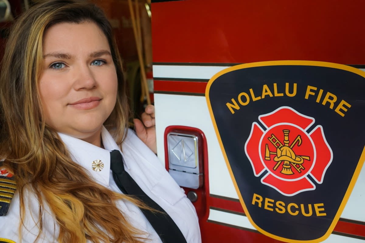 Fire Chief Sarah Shoemaker in uniform leading her volunteer firefighting team in Nolalu, Ontario