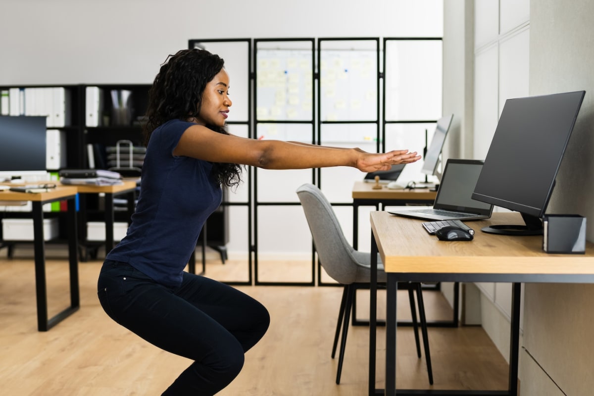 Person doing quick exercise break at home, demonstrating one-minute movement burst for diabetes management