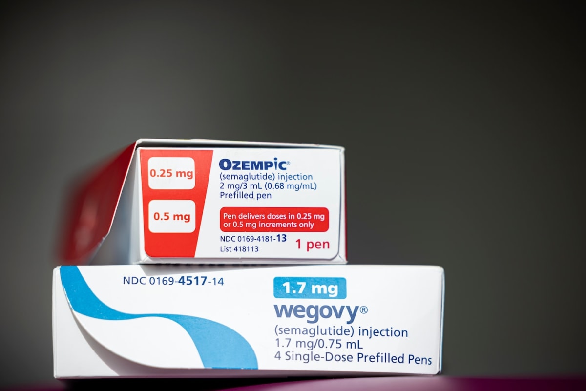 Medical researcher preparing semaglutide injection for veterans addiction treatment clinical trial study