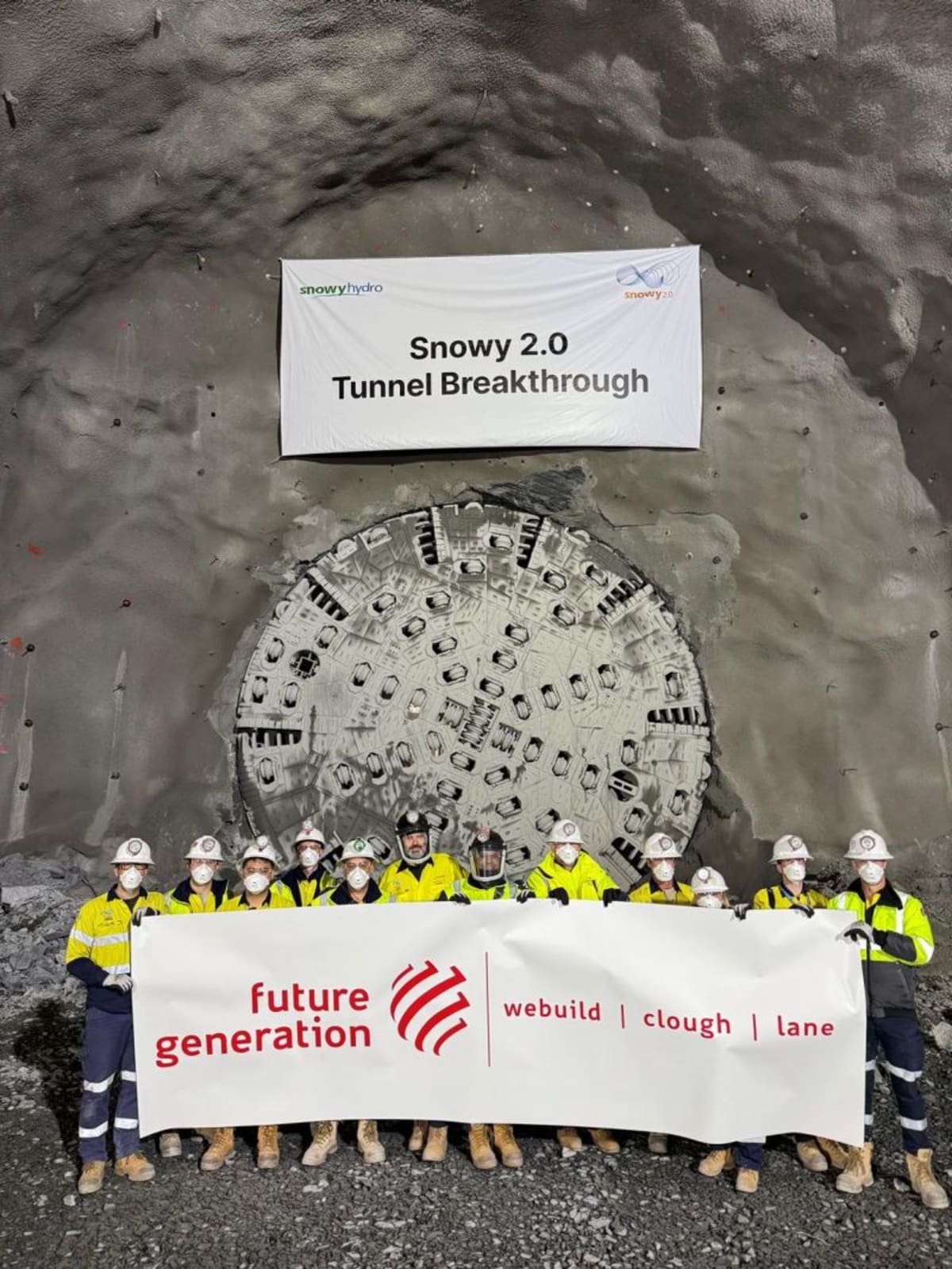 ** Massive tunnel boring machine Eileen emerging from rock tunnel in Australian Snowy Mountains hydroelectric project