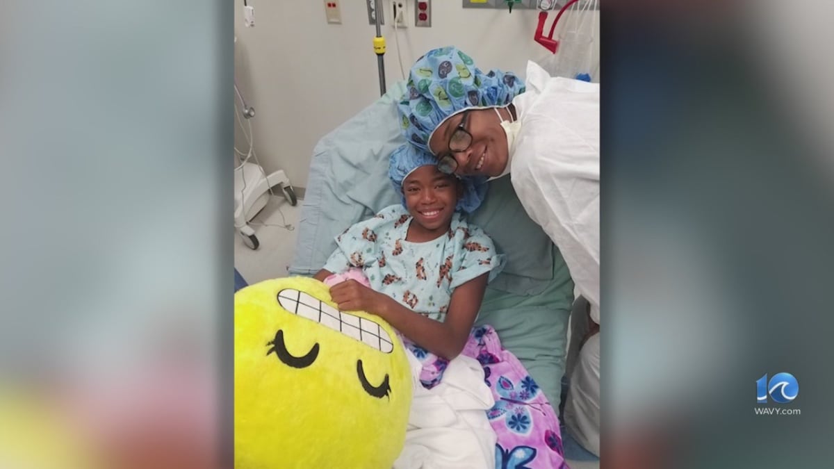 Young woman smiling at camera, college student and childhood thyroid cancer survivor