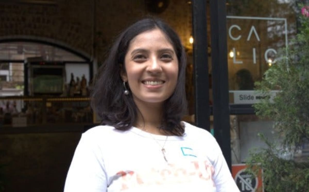 Group of diverse women smiling and talking together at casual café meetup in Sydney