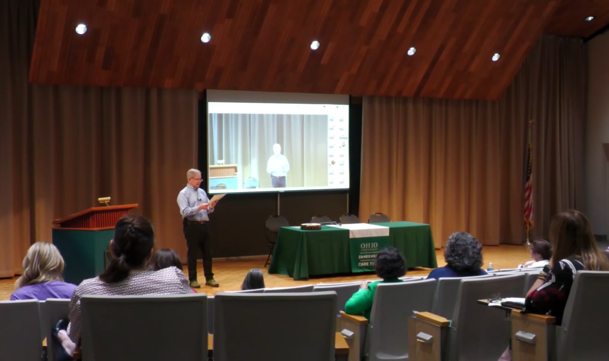 People gathered at Ohio University Zanesville sharing recovery stories at community summit
