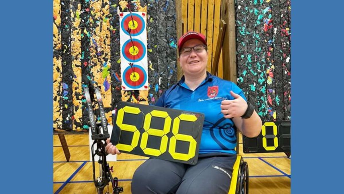 Czech para archer Sarka Pultar Musilova competing in wheelchair archery with bow drawn