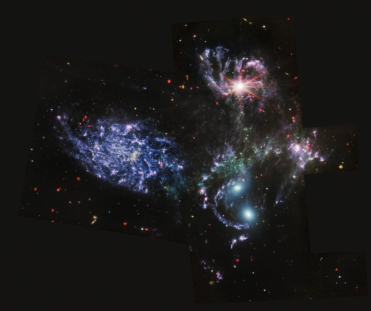 James Webb Space Telescope's deep field image showing ancient distant galaxies in colorful infrared light