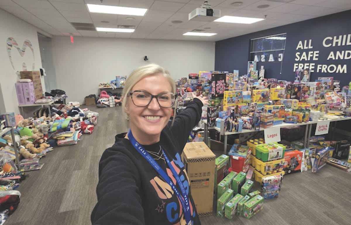 ** Home Depot employees delivering pallets of boxed cereal to Amazing Grace Food Pantry volunteers