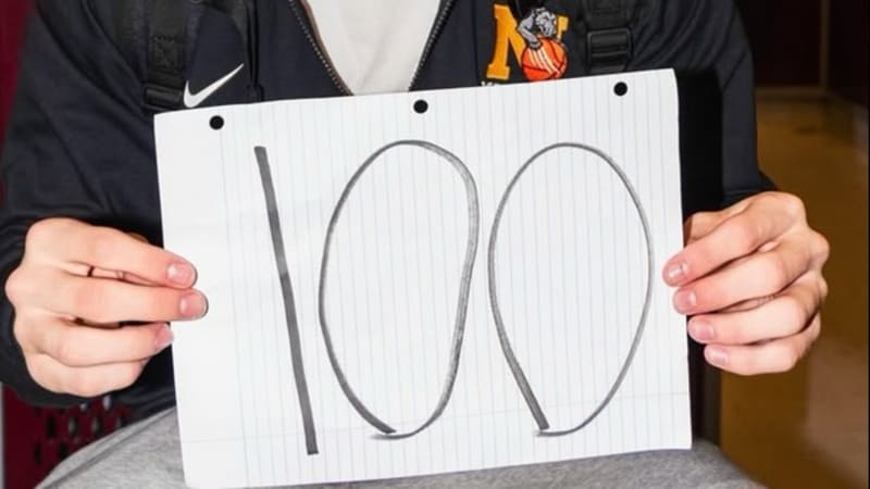 Adrian Stubbs celebrates after breaking Arizona's high school basketball scoring record with 100 points