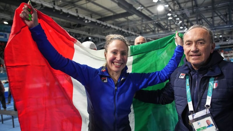 Italian speedskater Francesca Lollobrigida celebrates gold medal victory on indoor ice rink
