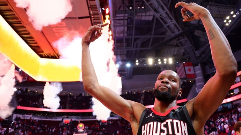 Kevin Durant in Houston Rockets jersey celebrating after making game-winning three-point shot against Phoenix Suns