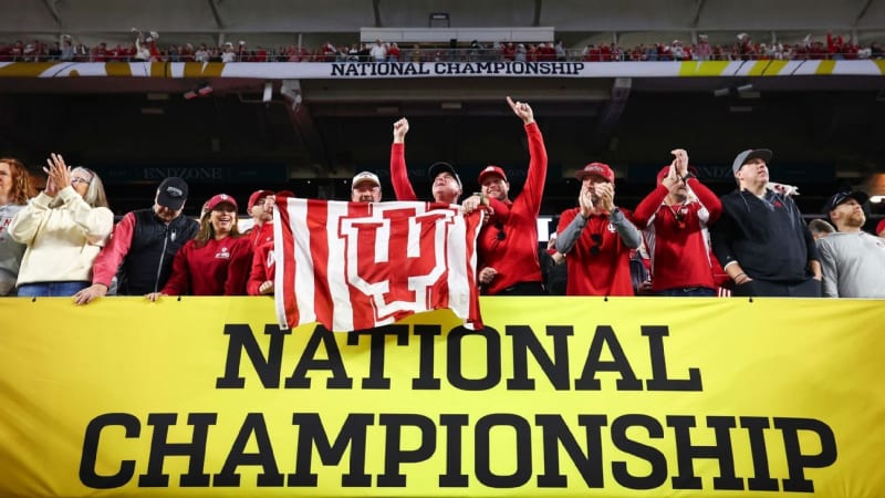 Indiana Hoosiers football players celebrating with confetti after winning national championship in Miami stadium