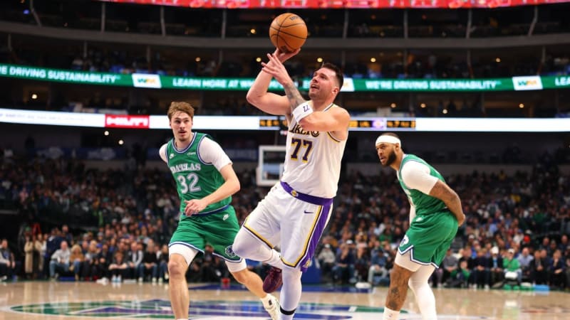 Luka Doncic drawing charging foul in Lakers jersey during fourth quarter comeback in Dallas