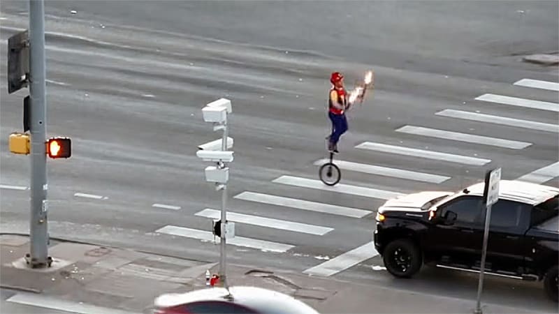 Fire Juggler on Unicycle Stops Colorado Traffic - Image 2