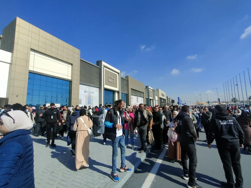 Crowds of families exploring book displays at Cairo International Book Fair opening day