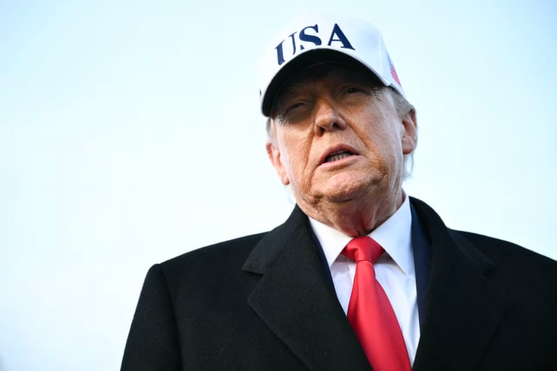 Diplomatic meeting room with flags representing Gulf Arab nations and international partners
