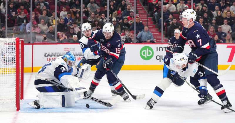 Brothers Matthew and Brady Tkachuk in USA hockey jerseys speaking at press conference
