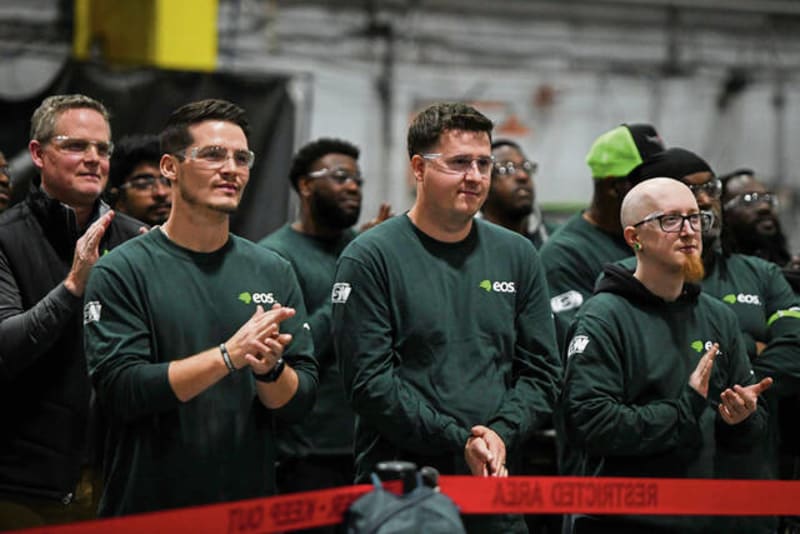 Workers at Eos Energy battery manufacturing facility celebrating company expansion announcement in Pennsylvania