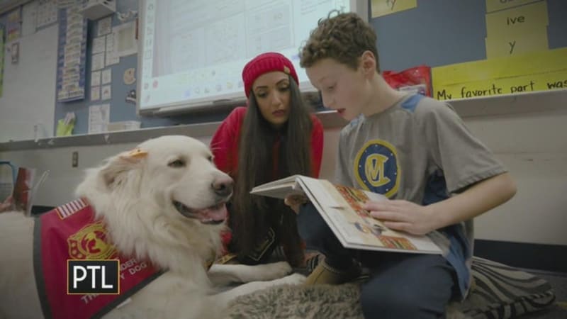 Lauren Rowe smiling in West Mifflin school hallway as educator and community hero