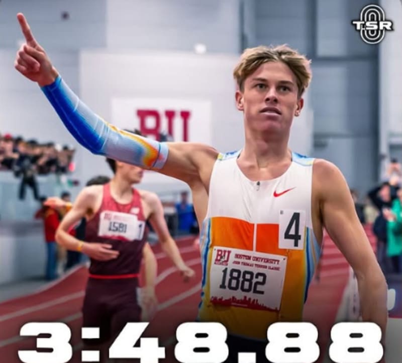 Young runner Sam Ruthe celebrating after breaking the mile world record at Boston University indoor track