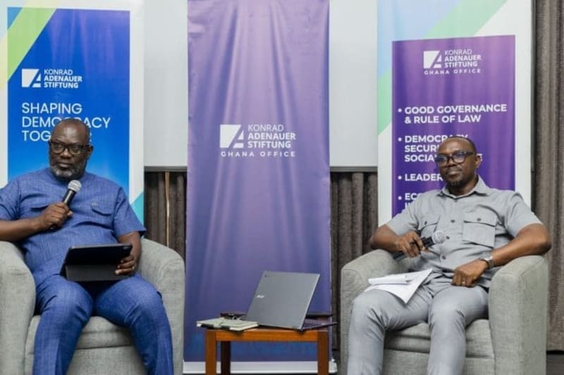 Migration policy stakeholders discussing diaspora remittances and development in Ghana forum setting