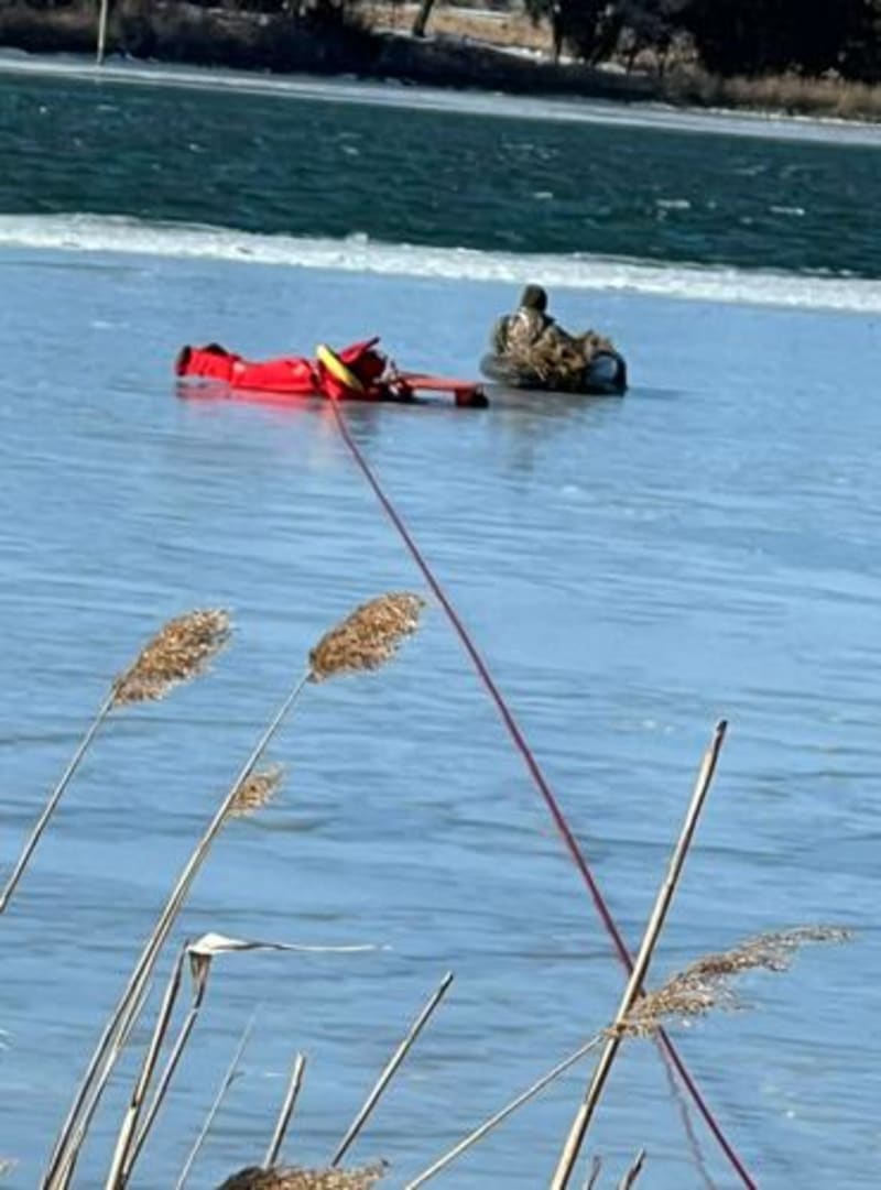 Firefighter Crawls 350 Feet Across Ice to Save Hunter - Image 3