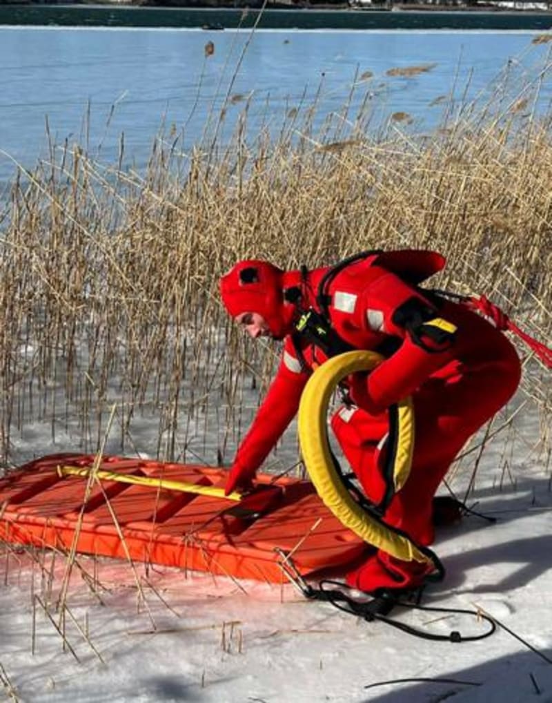Firefighter Crawls 350 Feet Across Ice to Save Hunter - Image 5