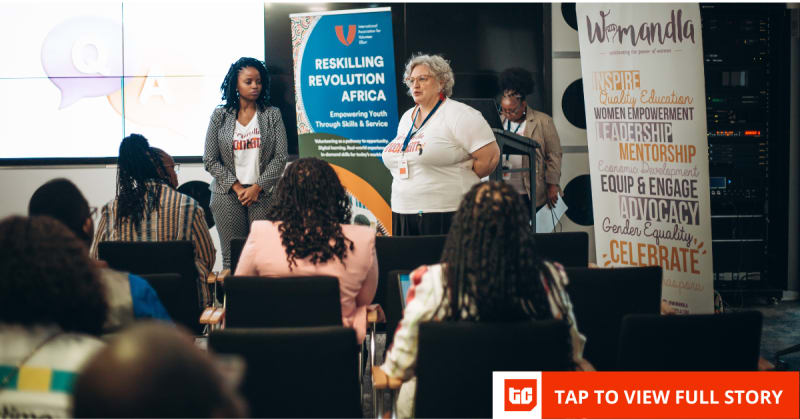 Young South African students learning digital skills on computers in bright classroom setting