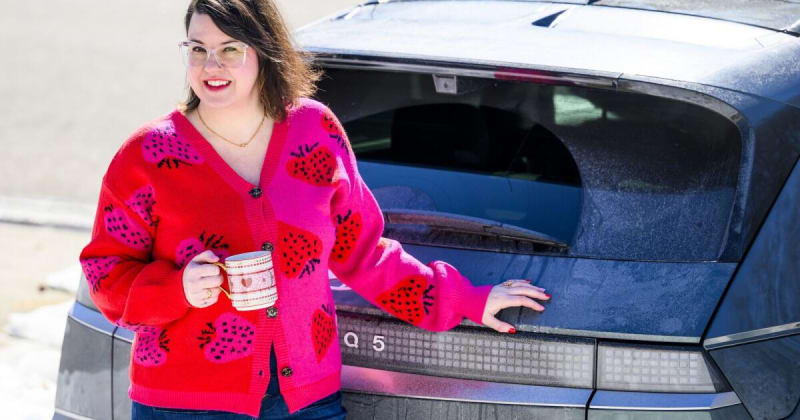 Ford F-150 Lightning electric truck plugged into home charging system providing backup power