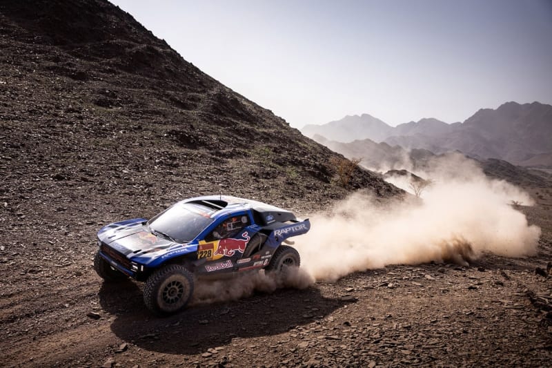Mitch Guthrie celebrating in Ford Raptor race truck after winning Dakar Rally Stage 3 at Al-Ula