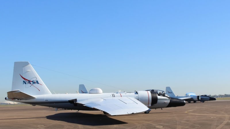 NASA WB-57 aircraft sliding down runway during emergency landing at Houston's Ellington Field