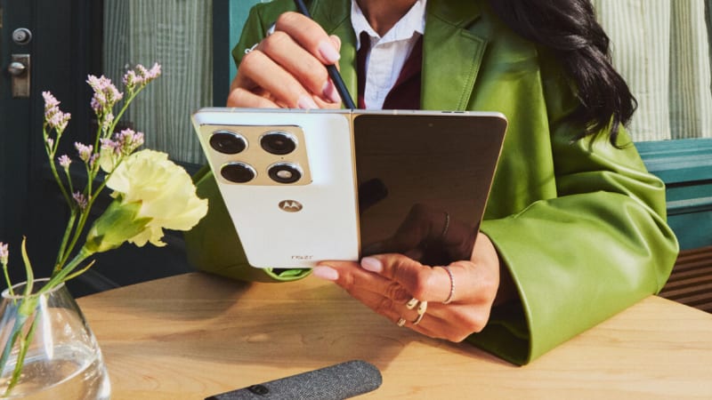 Motorola Razr Fold book-style foldable smartphone with dual displays and stylus pen showcased at technology event