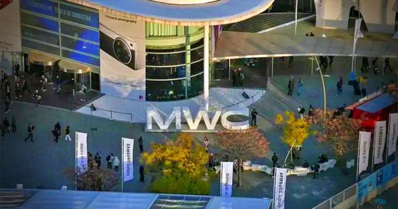 Mobile network base station towers against blue sky representing energy-efficient telecommunications technology
