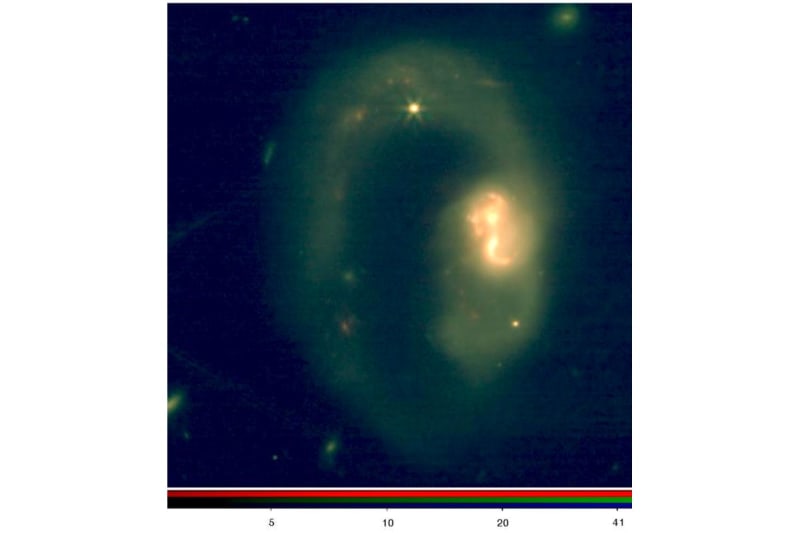 Webb Telescope Finds Galaxy Core Bursting With Carbon