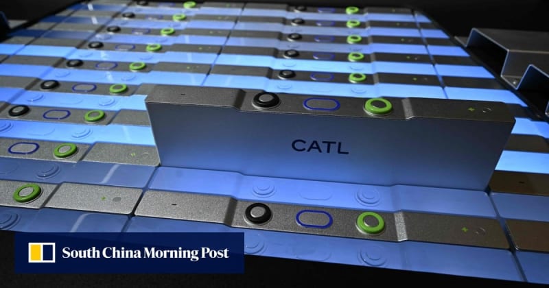 CATL and Nio executives shaking hands at partnership signing ceremony with electric vehicles and battery displays in background