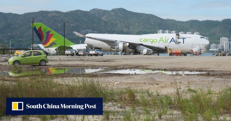 Aerial view of Lantau Island coastline showing development site near Hong Kong International Airport with infrastructure
