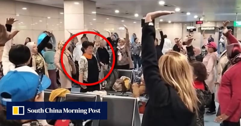 Chinese Women Lead Airport Qigong Class During 5-Hour Delay
