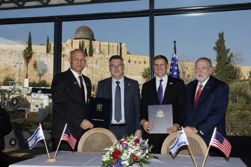 US and Israeli officials signing historic AI partnership agreement at Jerusalem ceremony