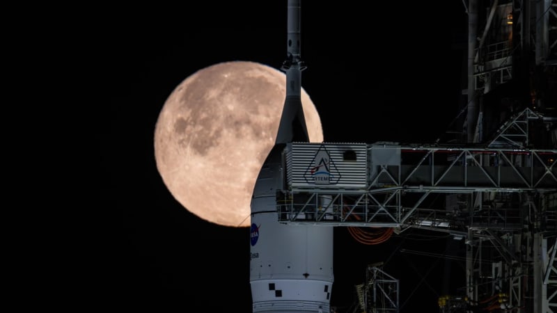 Snow Moon Rises Behind Artemis 2 Rocket Ahead of Launch