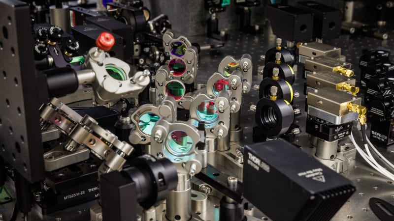 Close-up view of Microsoft's laser equipment writing data onto transparent glass storage medium