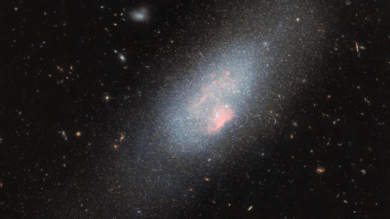 Cosmic Canvas: Dwarf Galaxy Reveals Universe's Hidden Artistry