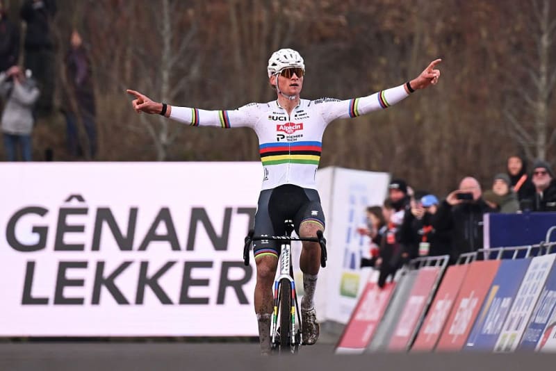 Mathieu van der Poel celebrating at finish line after winning cyclo-cross World Cup race