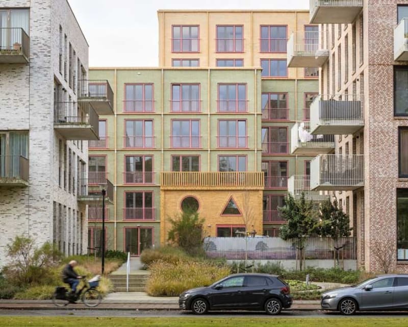 Dutch Social Housing Glows With Pastel Colors and Purpose - Image 4