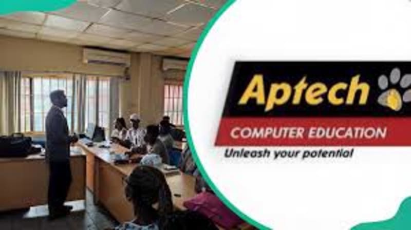 Nigerian students working collaboratively on computers learning artificial intelligence and programming skills in modern training facility