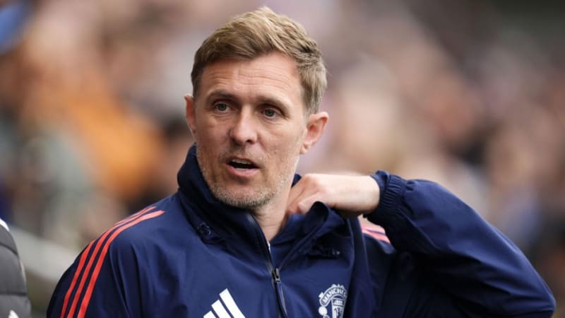Darren Fletcher in Manchester United coaching attire, looking focused and determined during training session at Old Trafford
