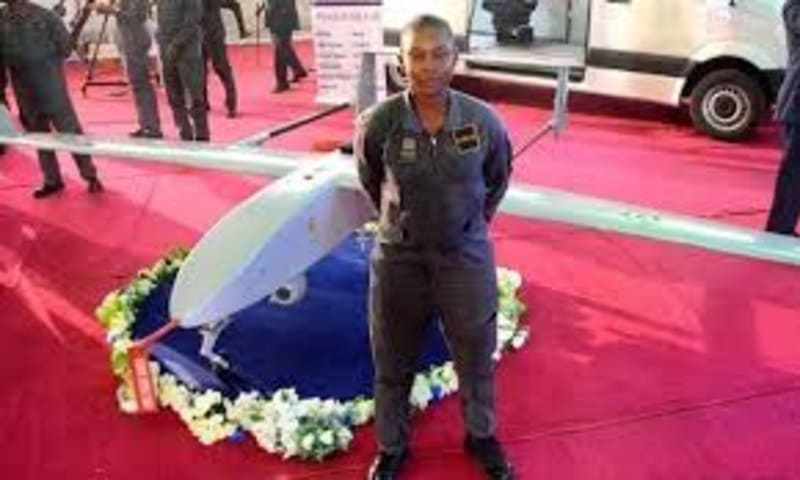 Lieutenant Nkemdilim Anulika Ofodile, Nigerian Air Force aerospace engineer, with the Tsaigumi Tactical UAV drone she designed