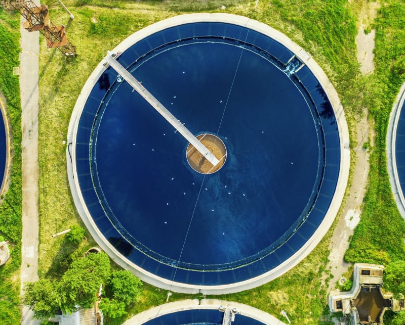 Microscopic view of methane-eating bacteria transforming pollution into biodegradable materials in laboratory setting