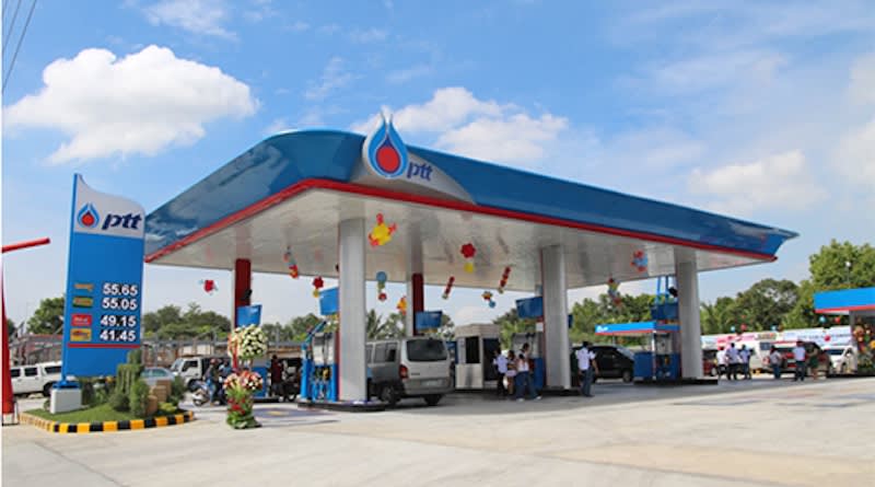 Modern electric vehicle charging at a public station in Germany with charging cable connected