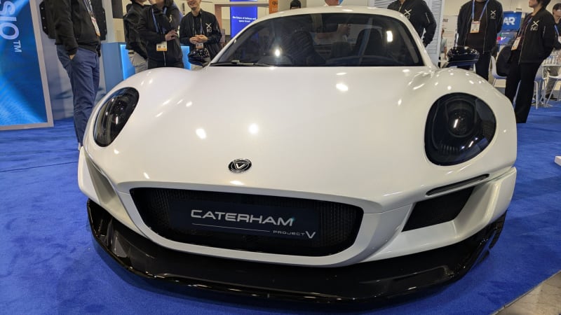 White Caterham Project V electric sports car prototype with low-slung body and distinctive fenders