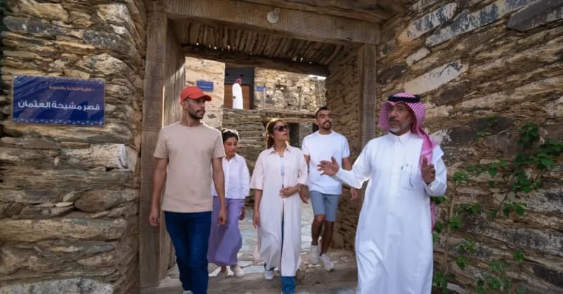 ** Historic buildings and palm trees in Al Atawlah Heritage Village, Saudi Arabia tourism destination